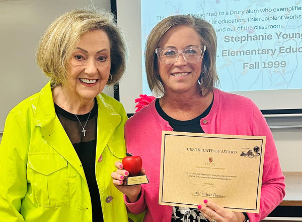  Sharon Price presents Stephanie Young with alumni award